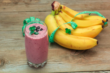 fruit smoothies and a bunch of bananas