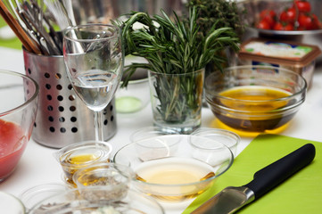 Restaurant food preparation, knives cutting boards.