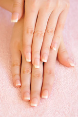 Woman hands with beautiful french manicure