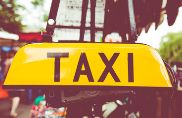Taxi sign in a market