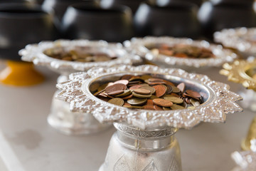 a little monk's alms bowl and bronze coin