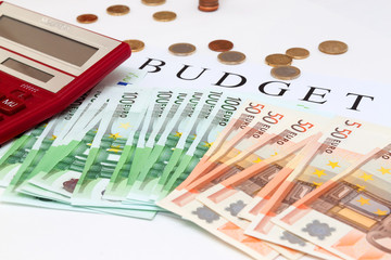 Large calculator on a lot of Euro cash