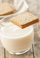 Cracker close up with glass of milk