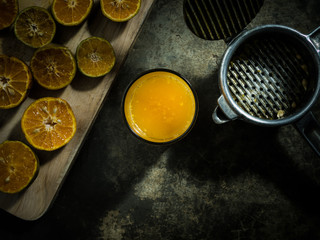 Still life Orange Juicer with orange juice.