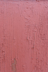 Background. The wooden painted door with paint cracks
