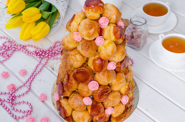 Croquembouche with pink roses and caramel threads
