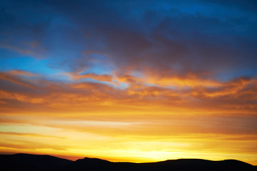 Land and dramatic sky