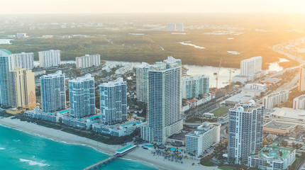 Wonderful skyline of Miami at sunset, aerial view