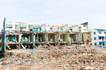 Obraz na płótnie Canvas Demolition of buildings destroyed
