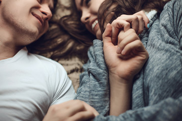 Young beautiful pair of lovers hug and kiss