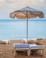 Relaxing facilities on the golden beach of Eilat - famous resort city in Israel