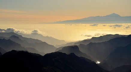 Fototapeta na wymiar Silhouettes of mountains and Tenerife island in background, Canary islands