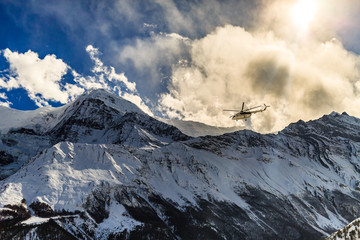 Mountain rescue helicopter in Himalaya Mountains Nepal