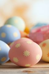Colorful Easter eggs on abstract background