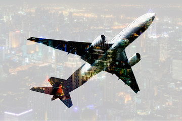 double exposure commercial airplane with blur cityscape backgrou
