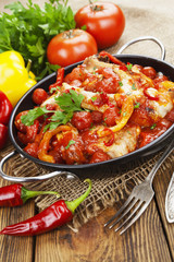 Chicken in a sauce of tomato and pepper
