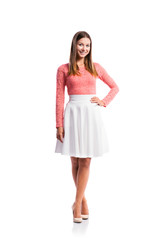 Fototapeta premium Girl, lace top, white skirt, heels, studio shot, isolated