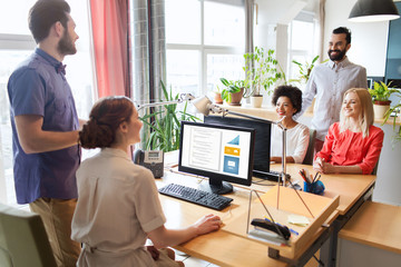 Fototapeta premium happy creative team talking in office