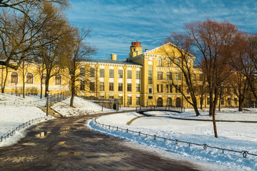 Yusupov garden and facade of Petersburg State Transport University's building in winter scene. © dr_verner