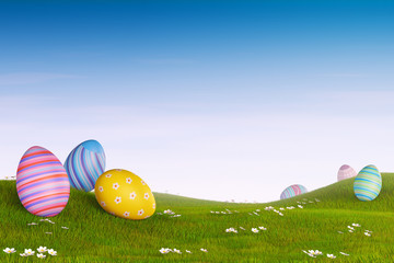 Decorated Easter eggs in a grassy hilly landscape