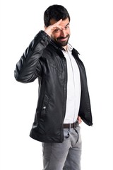 Man with leather jacket saluting