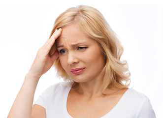 Fototapeta premium unhappy woman suffering from headache