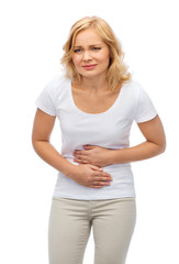 unhappy woman suffering from stomach ache