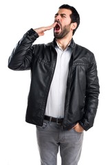Fototapeta premium Man with leather jacket yawning