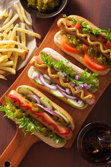 grilled hot dogs with vegetables ketchup mustard