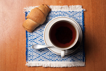 cup of tea and croissants