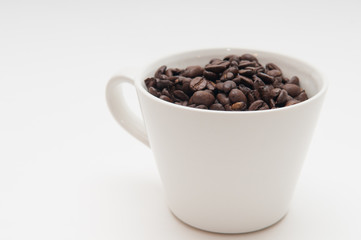 coffee beans in a mug