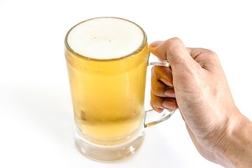 man hand holdin frosty glass of light beer for drinking on a white background