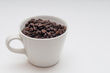 coffee beans in a mug