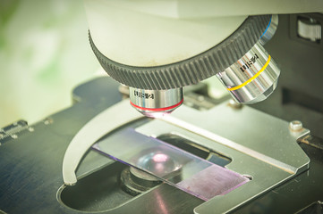 microscope for microscopic organism on the table
