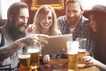 Using digital tablet in the pub