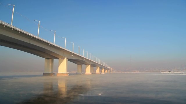 bridge over the Angara river in winter
