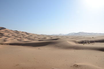Fototapeta na wymiar Sand dunes in back light