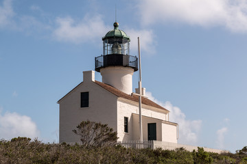 Fototapeta na wymiar The historic Old Point Loma lighthouse at Cabrillo National Monument in San Diego, California.