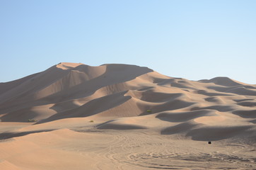 Fototapeta na wymiar Sand dune hill in desert Oman