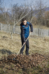 Teenage farmer spring cleaning