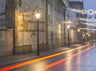 car trails in morning twilight in Krakow in Poland