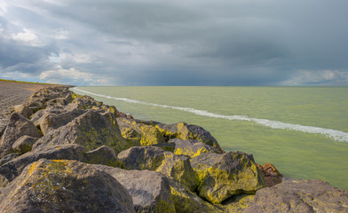 Dike along a lake in winter