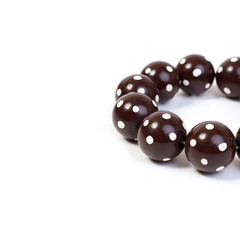 wooden bracelet on a white background