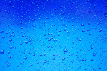 Blurred abstract background view of Rain drops on window surface