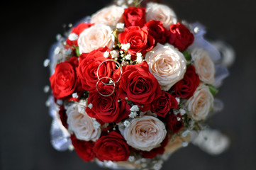A bouquet of red and white roses
