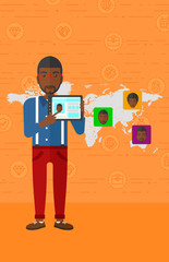 Man holding tablet computer with social media source.