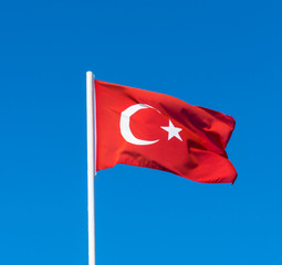 flag of Turkey on blue sky