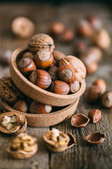 Nuts mix in a wooden plate