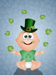 Funny baby with clovers