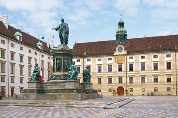 Fototapeta na wymiar Monument To Emperor Franz I in front of Amalienburg in Hofburg Palace